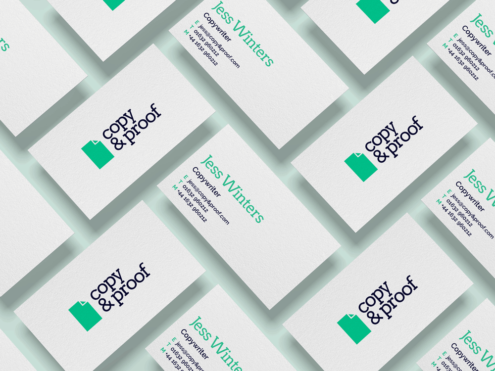 Mock up of Copy and Proof logo on business cards